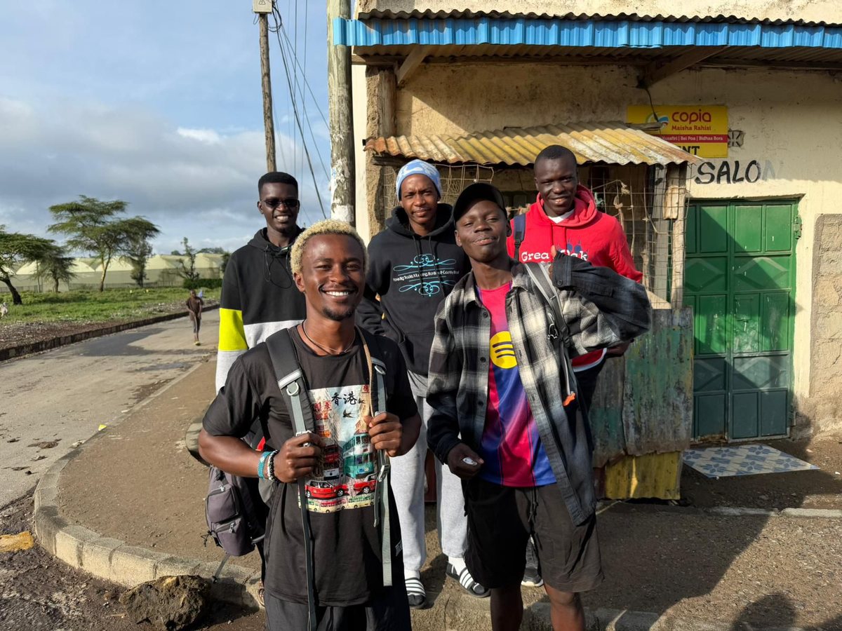 Five Exchange alumni together on a Kasarani street